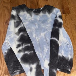 Blue and gray cropped sweatshirt.